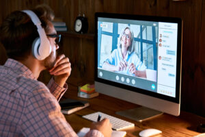 Man attending an online meeting